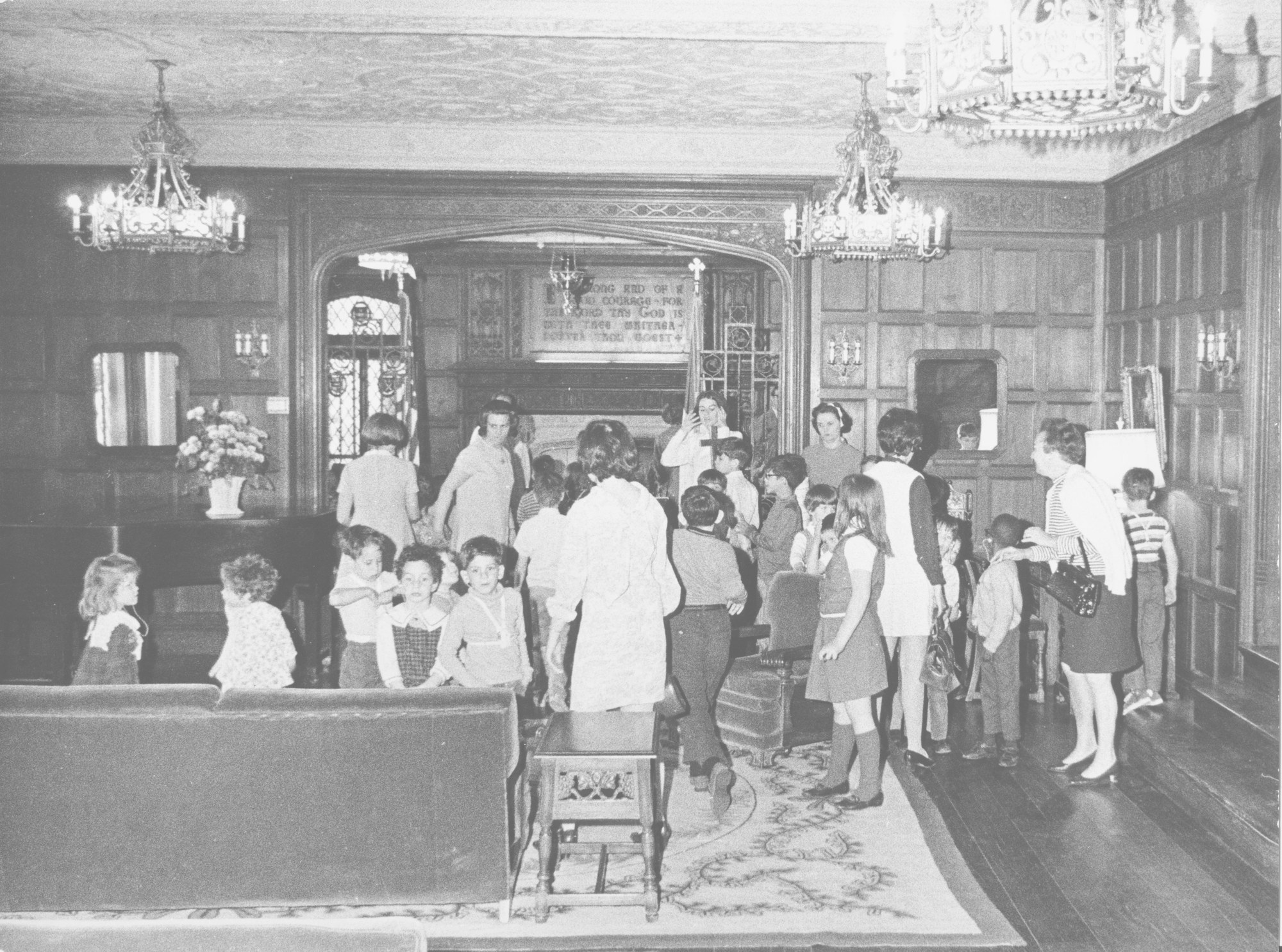 Children gathered in the Great Hall of Mill Neck Manor, c. 1970s — the heart of our mission then and now