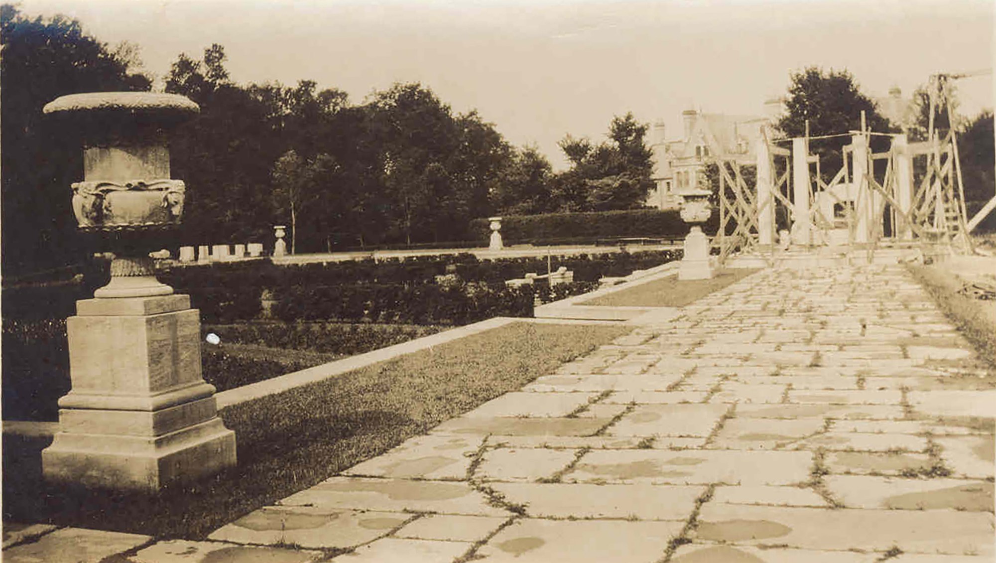The Sefton Manor estate during construction, c. 1924, with garden urns and scaffolding visible